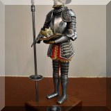 D104. Spanish knight statue. 9.5”h - $30